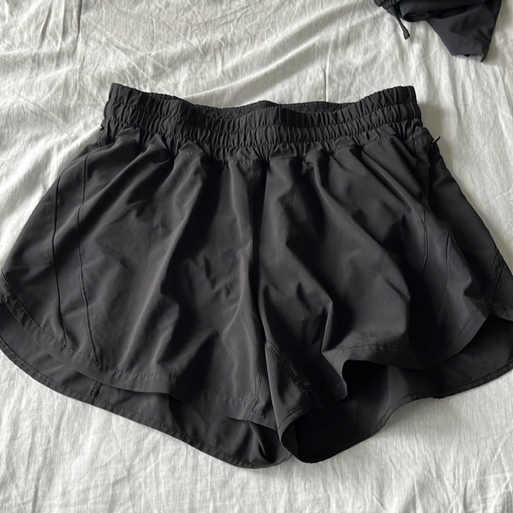 Lululemon track that 5in. Fully lined, size 10 and color is black